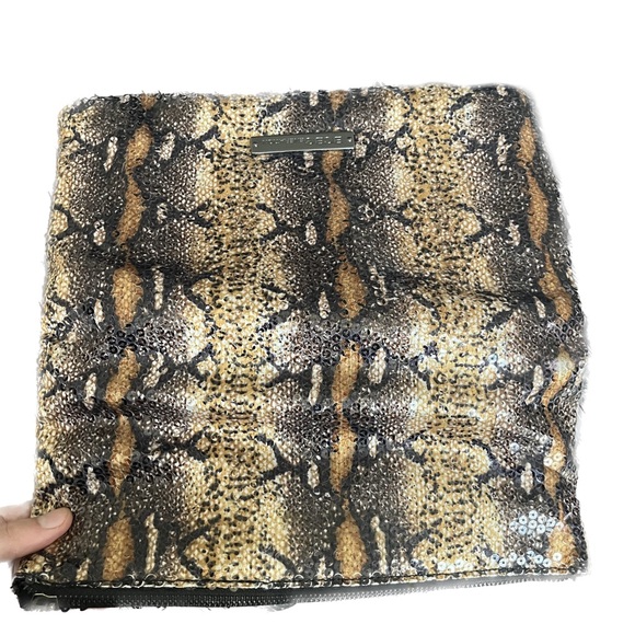 BCBGmaxazria White Glossy Sequined Styled Lazy Clutch in Animal Print Background - Picture 3 of 13